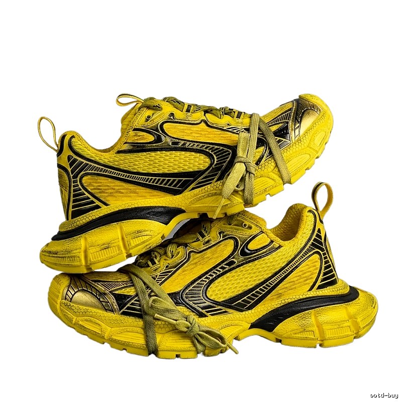Balenciaga retro-style yellow and black sports shoes