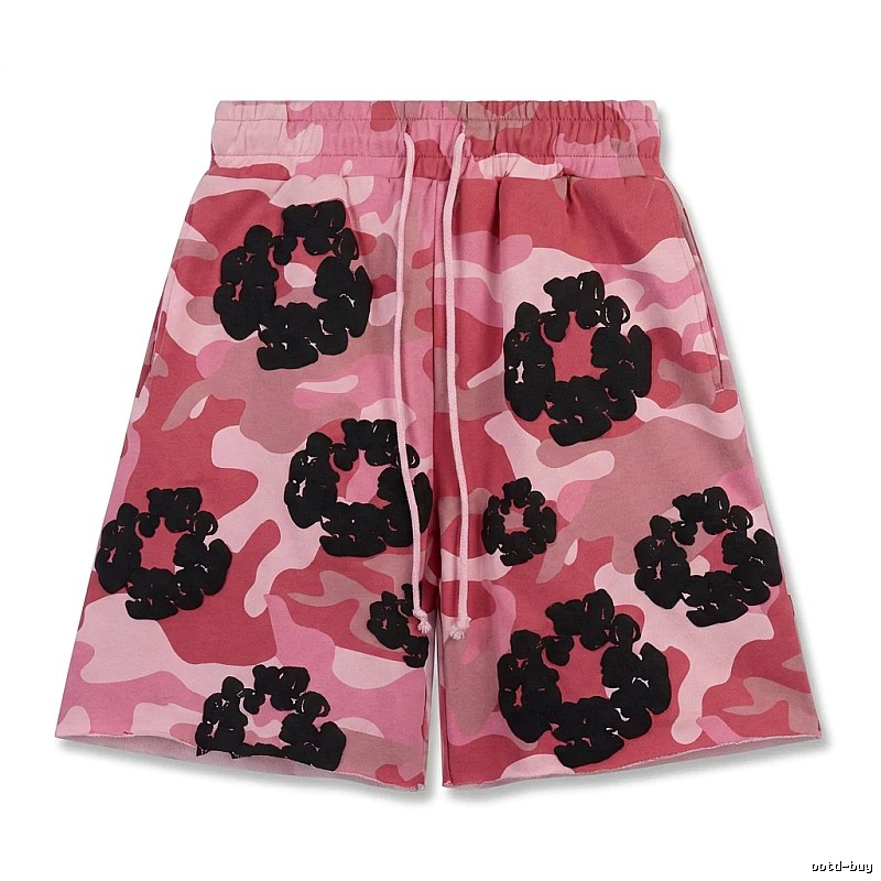 DENIM TEARS camouflage-style shorts