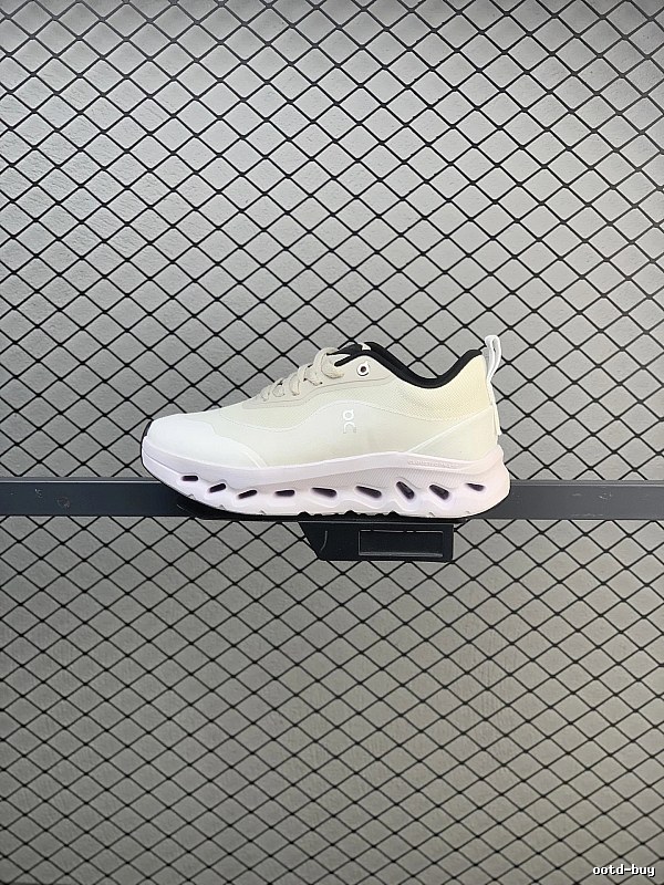 On Cloud Runners in White and Black, Finished with Layered Mesh Upper