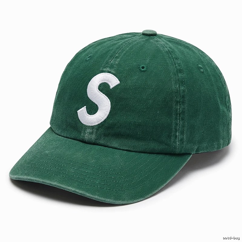 Vintage-style green hat with Supreme letters